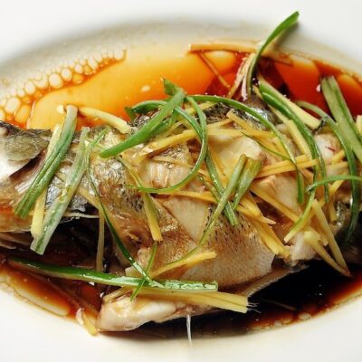Whole steamed fish with pickled plums